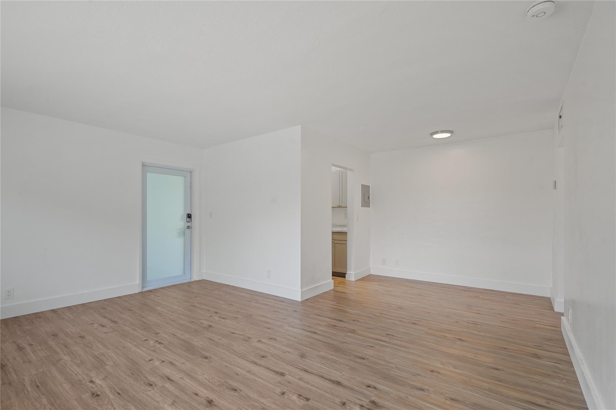 Come see this one bedroom, one bathroom apartment ! Just minutes from Downtown ! Welcome to this cozy and updated building located in the heart of Hollywood, Florida. Perfectly situated near downtown, this apartment offers convenience and comfort for dining, shopping and entertainment. Step into a spacious living area featuring beautiful modern flooring, fresh paint, and plenty of natural light throughout. The newly updated kitchen comes equipped with shaker cabinets, sleek countertops, and ample storage space, perfect for any home chef. The bedroom is generously sized, offering plenty of closet space and large windows for a bright and airy feel. The bathroom has been tastefully updated for a modern touch.