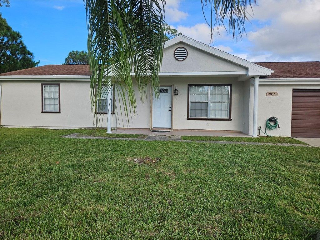 Photo of 2065 SE Oxmoor Terrace, Port Saint Lucie, FL 34952 (MLS # F10526765)