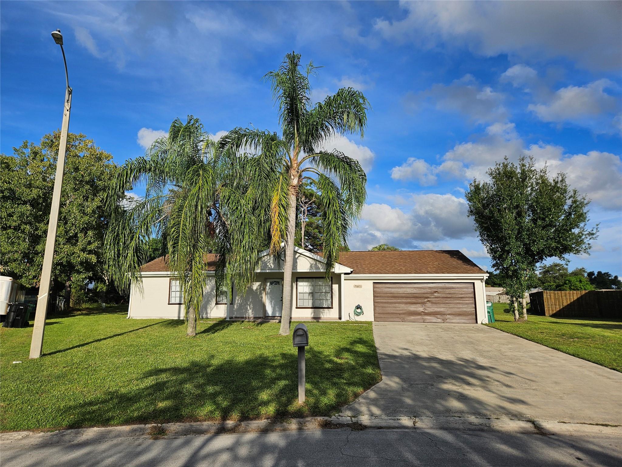 3-bedroom, 2-bathroom home featuring a spacious kitchen, newer baths, and tile through out,. Lovely Screened in patio and a two car garage. Annual rental with an open backyard that is convenient to school, shopping and medical facilities. No carpet and washer and dryer included. Move in ready book your showing appointment today!