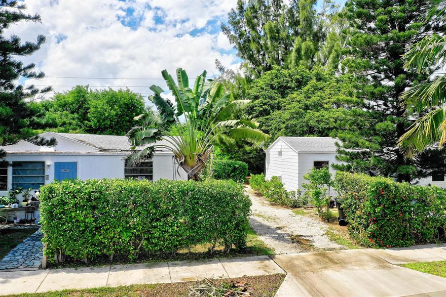 CASH FLOWING TRIPLEX ON MASSIVE QUADRUPLE SIZED LOT NEAR HISTORIC COLLEGE PARK, JUST SOUTH OF WEST PALM, AND MINUTES TO THE BEACH OR INTRACOASTAL. FEATURES A 3 BEDROOM TWO BATHROOM HOUSE AND TWO EFFICIENCY UNITS IN A SEPARATE BUIILDING. MULTI-FAMILY PROPERTY USE CODE MAY ALLOW FOR ADDITIONAL UNITS TO BE BUILT ON THE PROPERTY.  LARGE DRIVEWAY ALLOWS FOR AMPLE PARKING AND ACCESS TO RECREATION AREA.