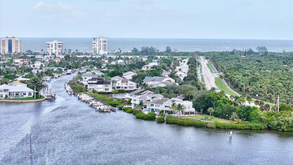 Photo of 2486 Harbour Cove Drive, Hutchinson Island, FL 34949 (MLS # B26063941)