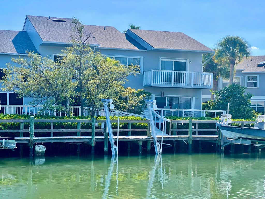 Photo of 2486 Harbour Cove Drive, Hutchinson Island, FL 34949 (MLS # B26063941)