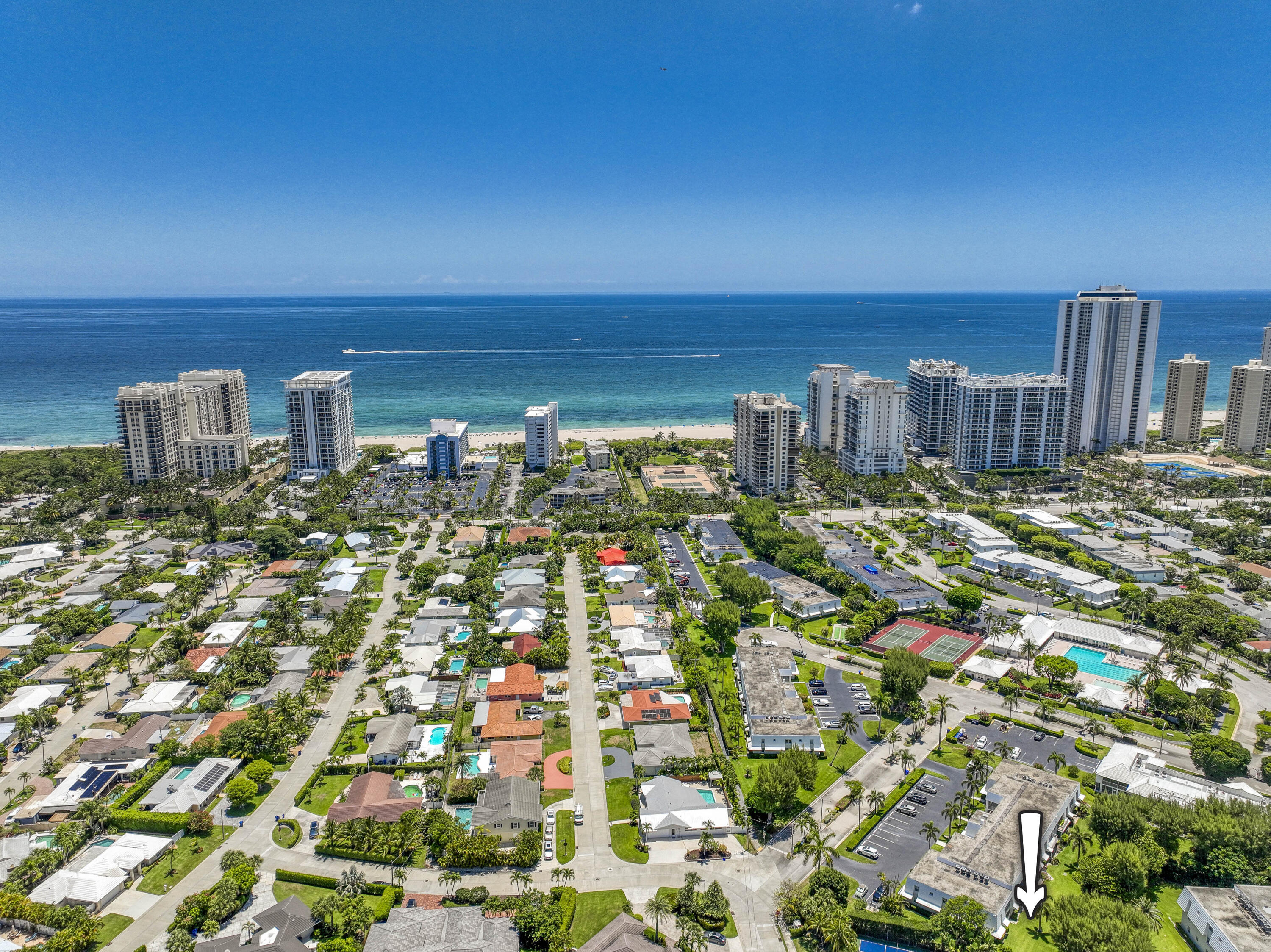 Your dream vacation home is ready in this beautifully updated and fully furnished TWO BEDROOM, TWO BATH PLUS DEN first-floor end unit. With 1,490 square feet of living space, this bright condo features hurricane-impact glass windows and sliding doors throughout. Enjoy a short walk to the clubhouse and deeded access to Sugar Sands' stunning sandy beach. This vibrant community boasts fantastic amenities, while top restaurants, shopping, and the beach are just minutes away. Experience local favorites like the Peanut Island Shuttle Boat and Sailfish Marina. Your perfect getaway awaits!
