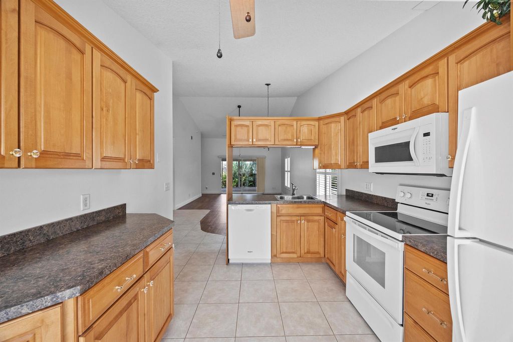 Photo of 11000 SE Sea Pines Circle, Hobe Sound, FL 33455 (MLS # R11113095)