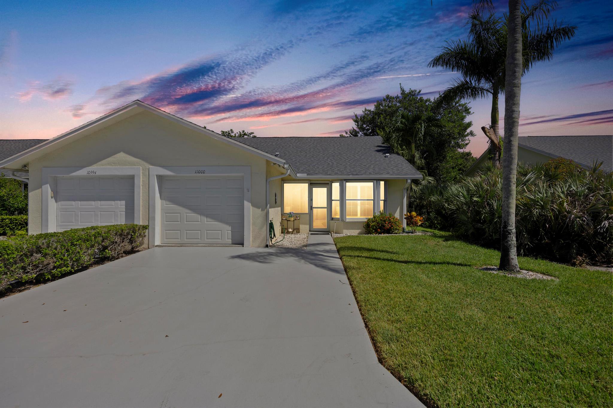 Sun-soaked and move-in ready, this 1300 square foot CORNER 2 bedroom 2 bathroom villa with 1 car garage checks every box. Vaulted ceilings and plantation shutters create an airy, open feel, while the fully updated interior features solid wood kitchen cabinets, newer appliances, and beautifully renovated bathrooms. Tons of natural light fill every space, and a 2018 roof with full hurricane protection keeps life worry‑free. The inclusive HOA covers your roof, building insurance, landscaping, cable, and pest control-just lock up and go. Enjoy the 55+ lifestyle with a sparkling community pool and amenities minutes from shopping, dining, and the beach. Villas this bright and turnkey don't last long and this one is priced to make your decision easy!