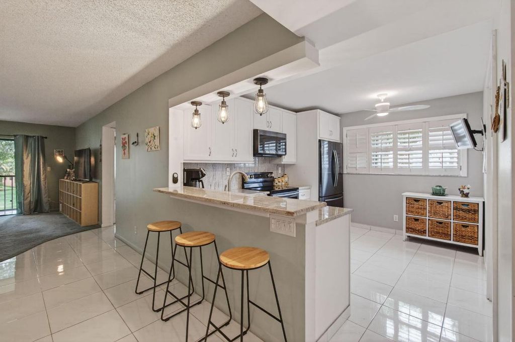 Photo of 15450 Pembridge Avenue #189, Delray Beach, FL 33484 (MLS # R11097740)