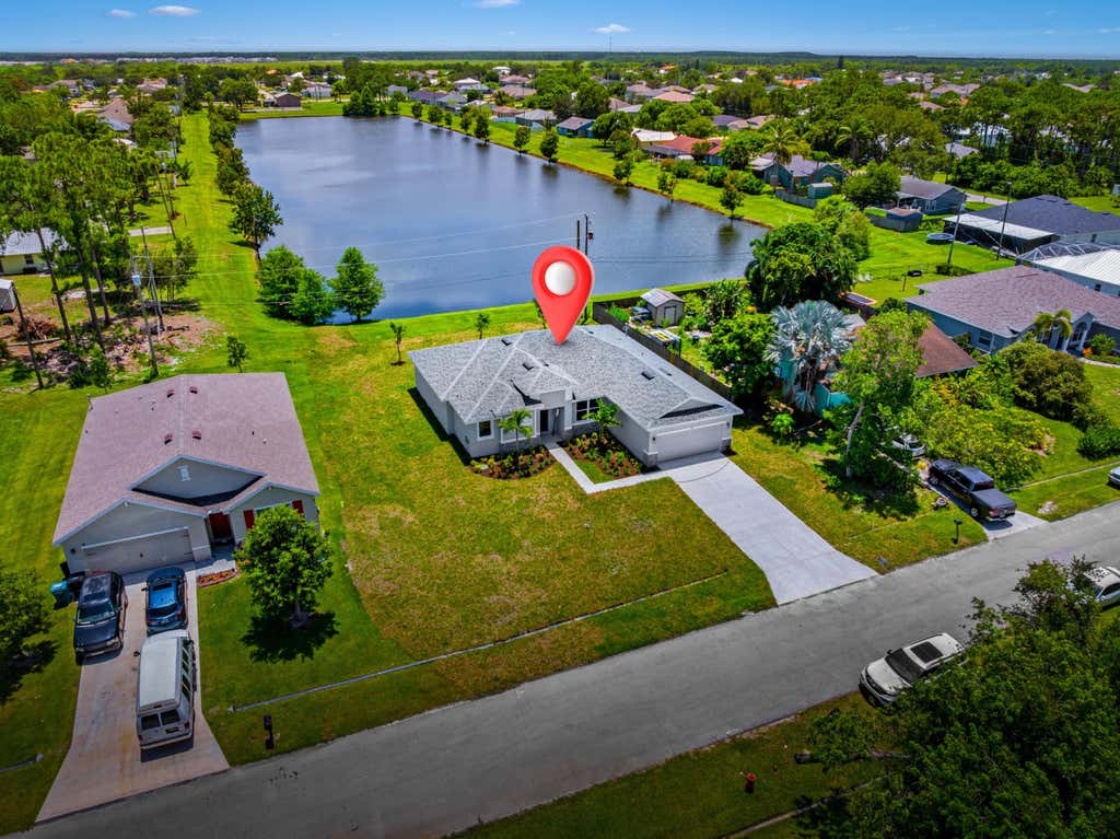 Photo of 324 SW Columbus Drive, Port Saint Lucie, FL 34953 (MLS # R11107884)