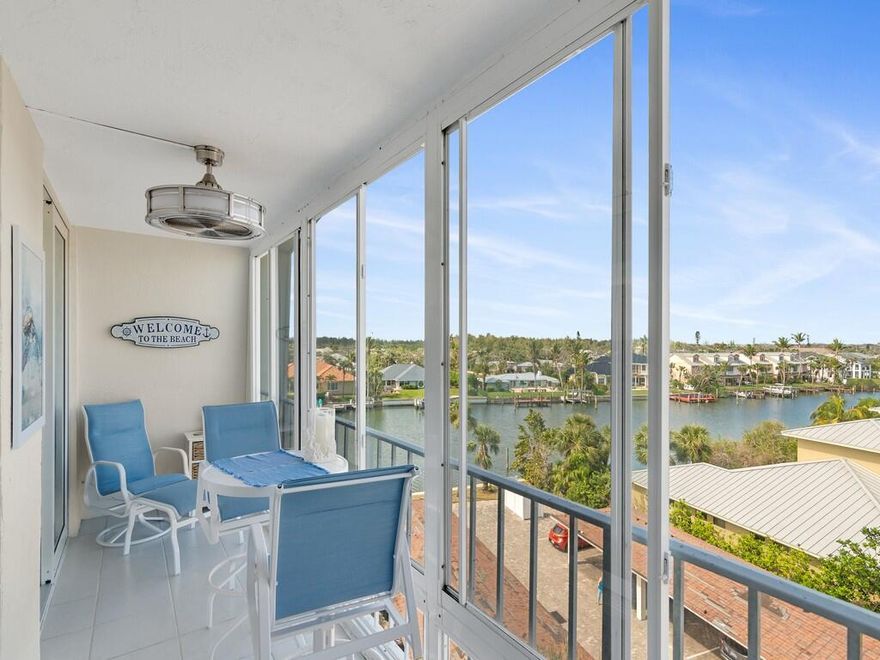 2BD/2BA 5th-Floor Penthouse Corner Unit - Experience breathtaking views of Bethel Creek w/ a glimpse of the ocean from your enclosed balcony. This updated unit features a fully remodeled kitchen w/ sleek quartzite countertops, high-end KitchenAid appliances, soft-close cabinetry, and a hidden washer and dryer. Private beach access just moments from your front door or take advantage of the day dock for paddleboarding and kayaking. Unwind by the heated pool while soaking in the serene waterfront views. Located close to town, this unit offers the perfect blend of convenience and coastal charm.