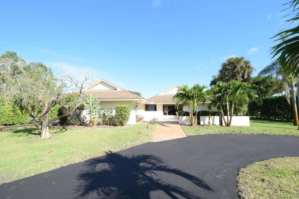 Photo of 4050 SE Whiticar Way, Stuart, FL 34997 (MLS # R10981548)