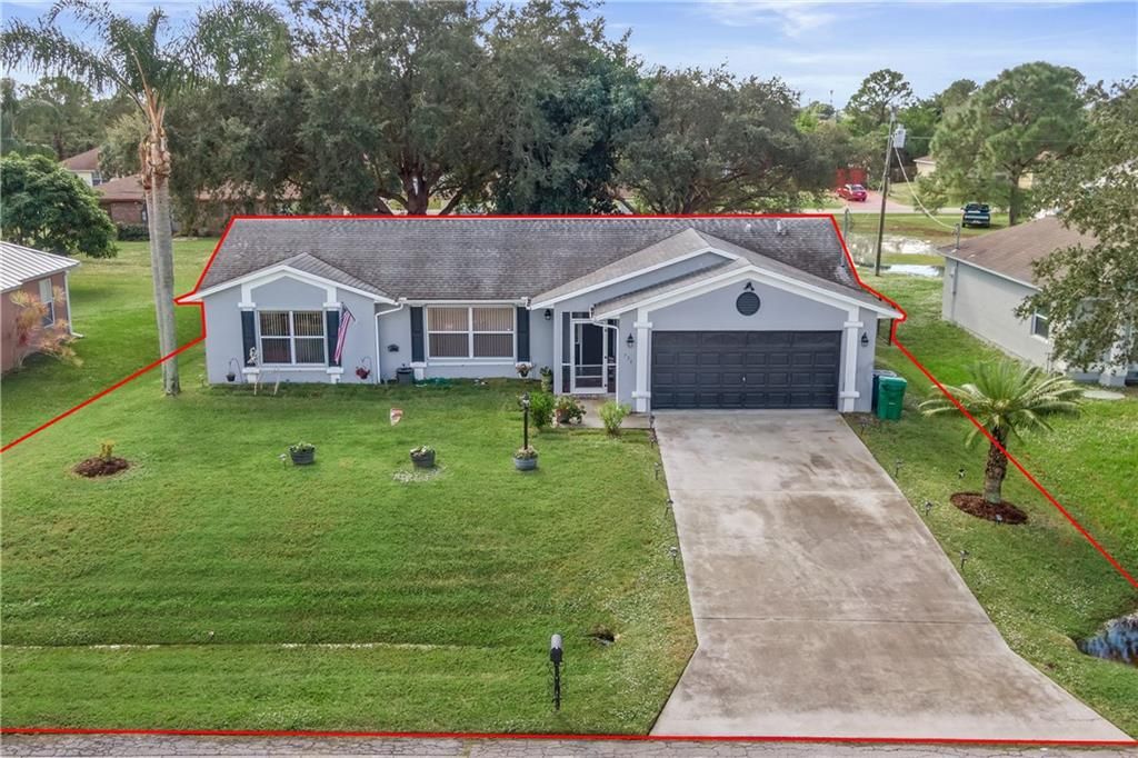 Photo of 736 NW Bayard Ave, Port Saint Lucie, FL 34983 (MLS # F10309136)