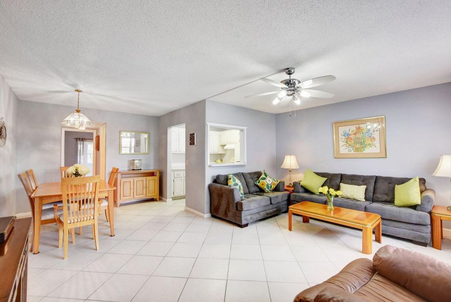 Immaculate 1-bedroom 2 and a half bath condo is located in the desirable Century Village. Very well maintained, freshly painted, renovated hall bath, newer ceiling fans, tiled floors throughout plenty of closet space newer AC features a heat setting for the cooler months. Enjoy the pleasant garden view from your peaceful patio. stylish furniture including television is included in the sale price, move right in! There are numerous activities to enjoy Pickleball tennis, shuffleboard, 1200 seat theater, card room, racquetball and sailing on the beautiful lakes. Located on the community grounds is a hair, nail salon.  There is a community bus to transport in the Village and outside to shopping, fine dining and much more.  This is a 55 and over community.