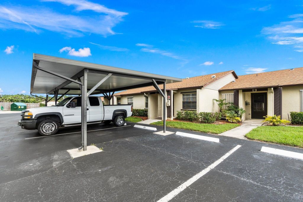 Photo of 6012 Indrio Road #E2, Fort Pierce, FL 34951 (MLS # R10907475)