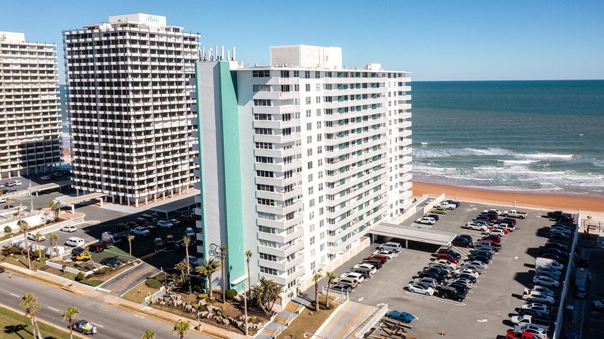 Wake up to breathtaking ocean views in this beautifully updated beachfront condo in the heart of Daytona Beach. Offered fully furnished, this move-in-ready retreat features an updated kitchen, modern flooring throughout, and a brand-new 2025 A/C unit for year-round comfort. A convenient Murphy bed maximizes space while providing comfortable accommodations for guests. Enjoy the convenience and security of private underground parking, plus resort-style living with cable, internet, and water all included in the HOA. Whether you're looking for a full-time residence, vacation getaway, or investment opportunity, this coastal gem offers the perfect blend of comfort, convenience, and beachside living.