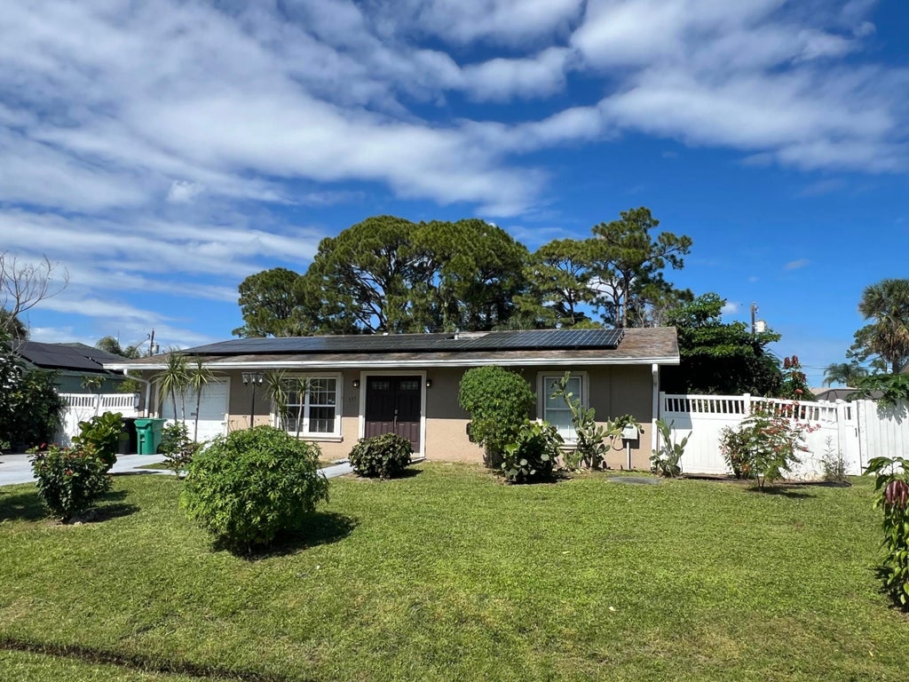 Photo of 557 NW Sherbrooke Avenue, Port Saint Lucie, FL 34983 (MLS # B26092784)
