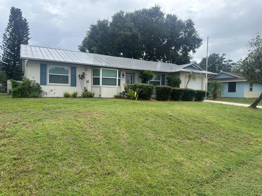 Photo of 3541 SW Voyager Street, Port Saint Lucie, FL 34953 (MLS # R11012541)