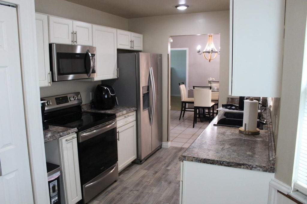 Photo of 3541 SW Voyager Street, Port Saint Lucie, FL 34953 (MLS # R11012541)