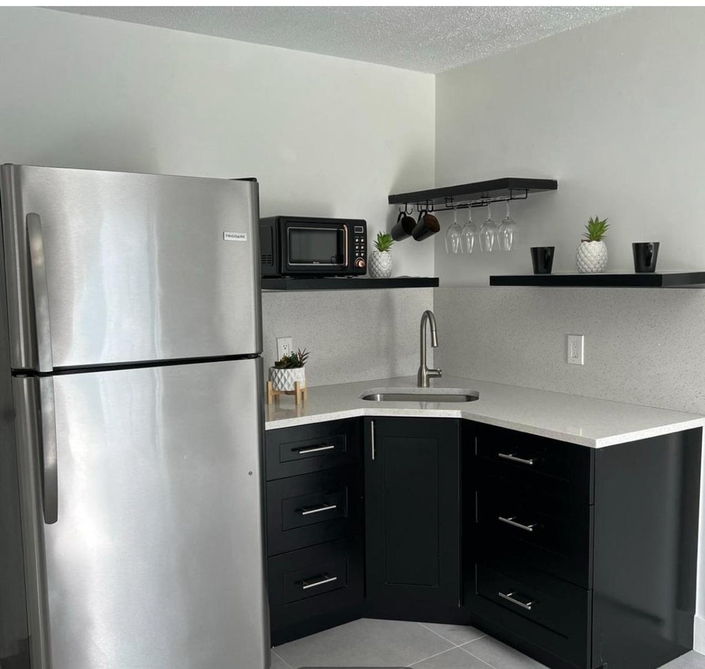 Photo of 4791 Elmhurst Rd #A, West Palm Beach, FL 33415 (MLS # R11104576)