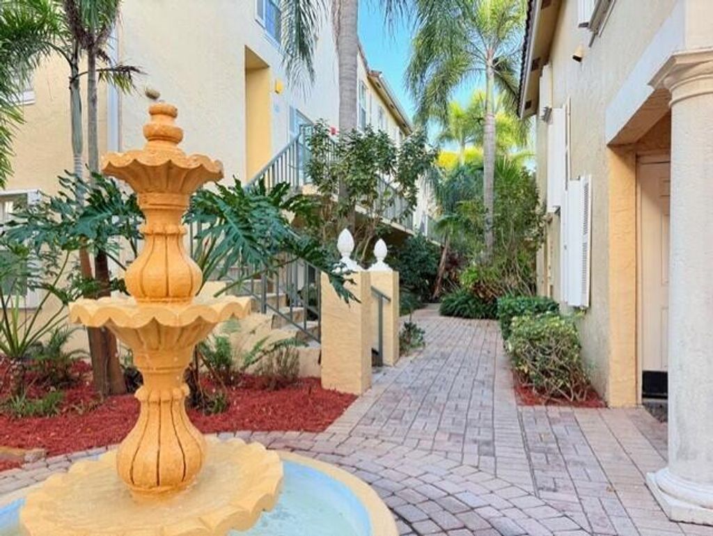 Photo of 1010 Lake Shore Drive #104, Lake Park, FL 33403 (MLS # R11063836)