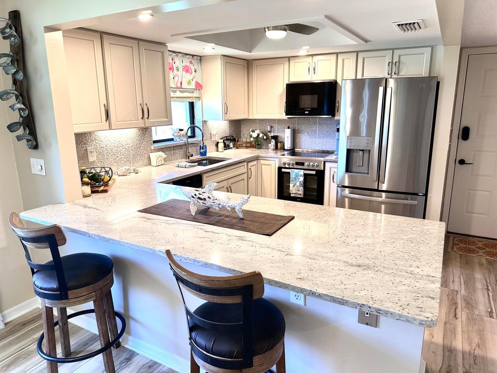 Photo of 301 SW South River Drive #206, Stuart, FL 34997 (MLS # R11093139)