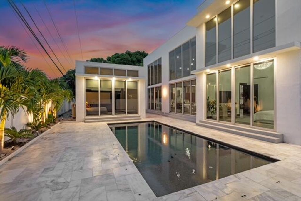 Photo of 284 NE 7th Street, Boca Raton, FL 33432 (MLS # B26044261)