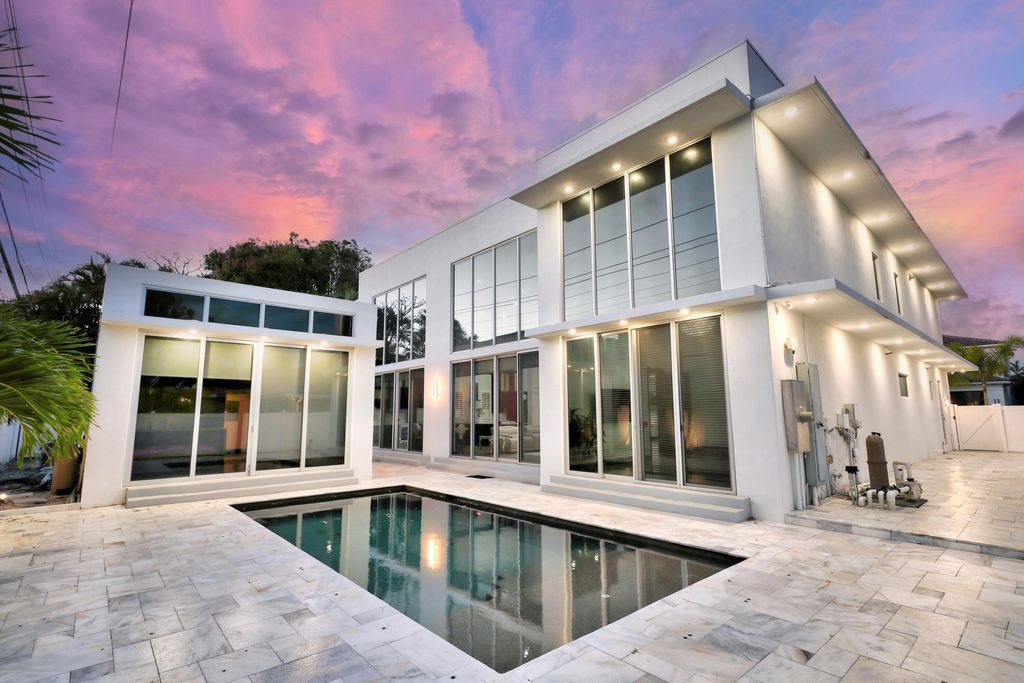 Photo of 284 NE 7th Street, Boca Raton, FL 33432 (MLS # B26044261)