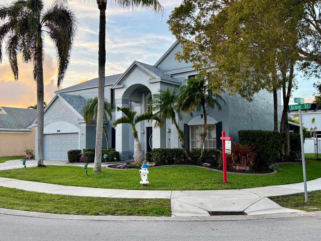 Photo of 10319 GROVE Street, Cooper City, FL 33328 (MLS # B26060407)