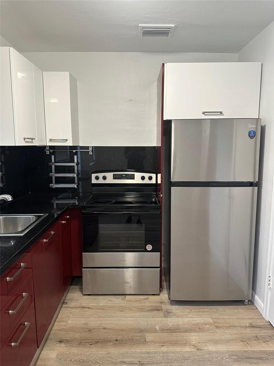 wOw! 2 bedroom / 1 bath with an updated kitchen. Kitchen has gorgeous, black, granite counter tops, stainless steel appliances, and sleek looking cabinets with plenty of storage space. Beautiful wood-like flooring and a fresh coat of paint throughout. Located in the quiet Coronet Acres Condo, this condo has great access to the beach, I-95, and the shopping and dining nearby. You will be thrilled to call this place your home! Management and HOA approval is required. HOA approval time is up to 30 DAYS! NO TRUCKS ALLOWED.