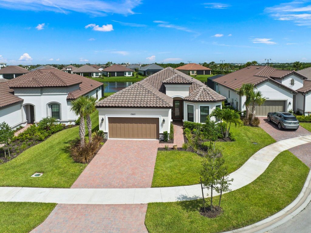Photo of 13012 SW Ambra Street, Port Saint Lucie, FL 34987 (MLS # R10958080)