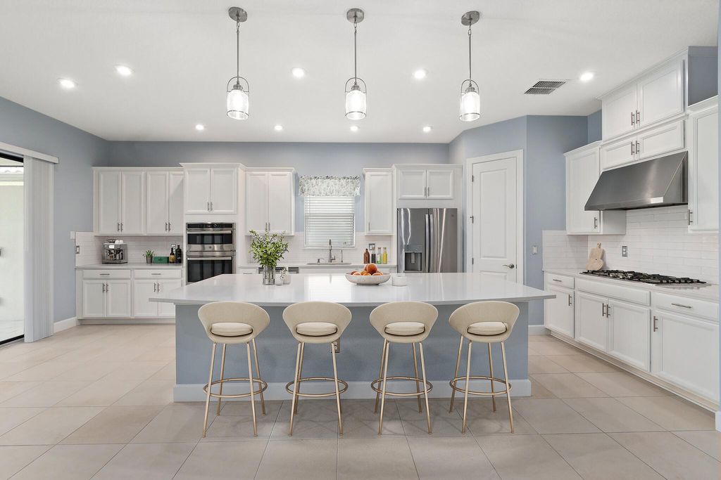 Photo of 13012 SW Ambra Street, Port Saint Lucie, FL 34987 (MLS # R10958080)