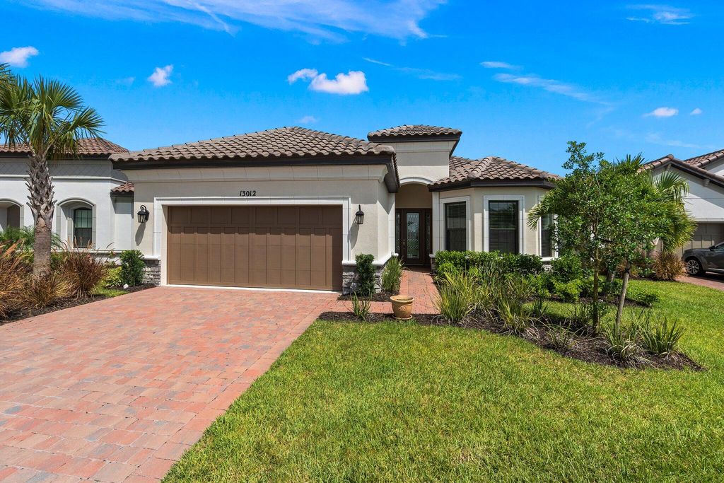 Photo of 13012 SW Ambra Street, Port Saint Lucie, FL 34987 (MLS # R10958080)