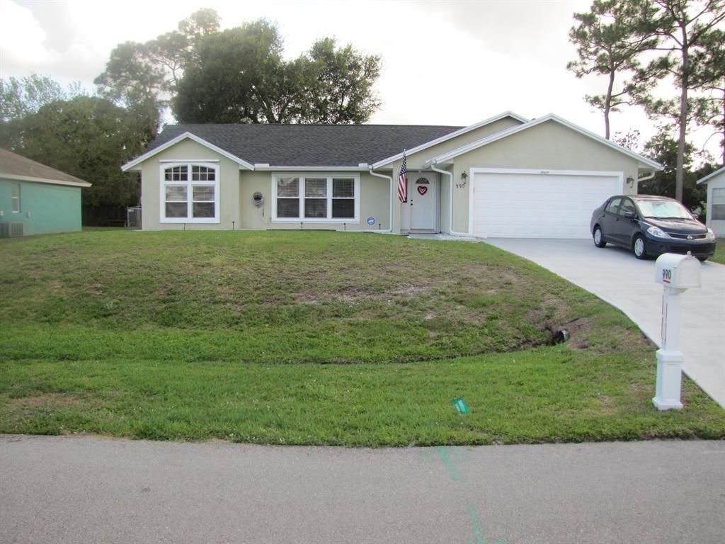Photo of 990 SW Nichols Terrace, Port Saint Lucie, FL 34953 (MLS # R10785194)