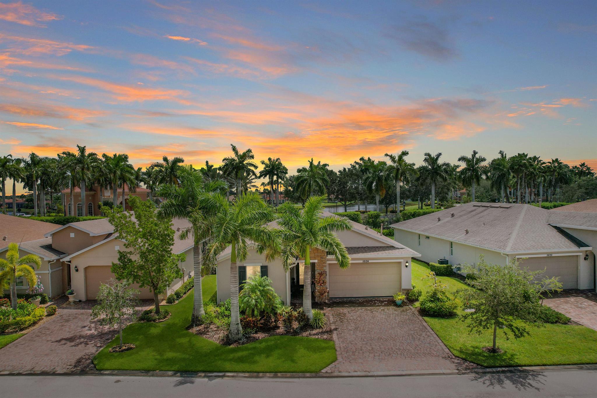 This stunning home is nestled in the active resort-style community of Vitalia at Tradition. This (2) bed, (2) bath, PLUS a DEN is 1992 sq ft and complete with a (2) Car Garage! The ESTERO Model is perfect for entertaining & relaxing. This home features 42'' cabinets, granite countertops, 9-11 ft ceilings, impact windows & doors, plantation shutters, a spacious cook island, & stainless steel appliances. The covered paver patio offers a perfect spot for unwinding with a glass of wine. The active 55+ gated community offers resort-style amenities, a clubhouse, pool, tennis/ pickleball courts, & a fitness center. HOA fee includes lawn care & cable. Residents can enjoy a vibrant community with various clubs & activities. Perfect location near shopping, dining & top-rated medical & schools.