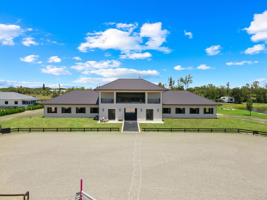 Premium Barn Rental on 6+ Acres -Up to 12 Stalls Available in a fabulous New Construction Barn! Less than 2 miles by horse or golf cart to the entrance of WEF. Listing Price is monthly seasonal price per dry stall. Bring your horses home to this beautifully equipped, center-aisle barn, nestled on over 6 lush acres. This property is ideal for a boutique show-jumping operation. Train worry free in the 150' x 230' Ebb & Flow arena with GGT mix footing by JWTG. This well-appointed barn features a temperature-controlled tack room, feed room, and a stylish rider's lounge. Other amenities include, round pen, ample turnout (9 Paddocks), 2 RV hook-ups available, laundry room, and tons of storage for hay, shavings, and trailer parking.  The property also has room for extra tent stalls if necessary.