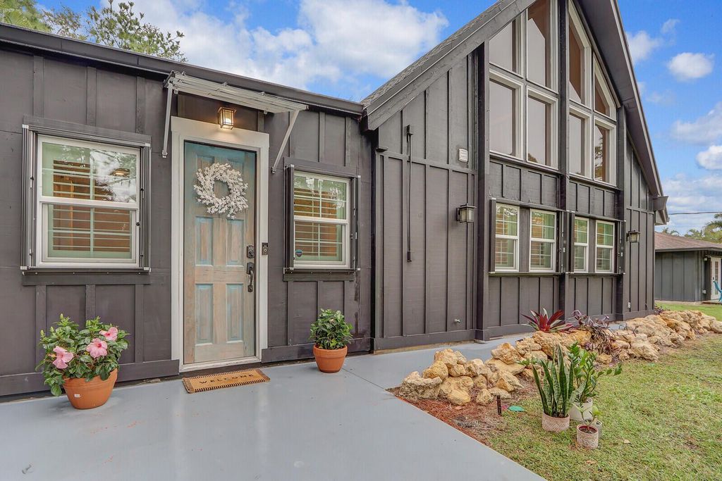 Photo of 10730 154 Road N, Jupiter, FL 33478 (MLS # R10951806)