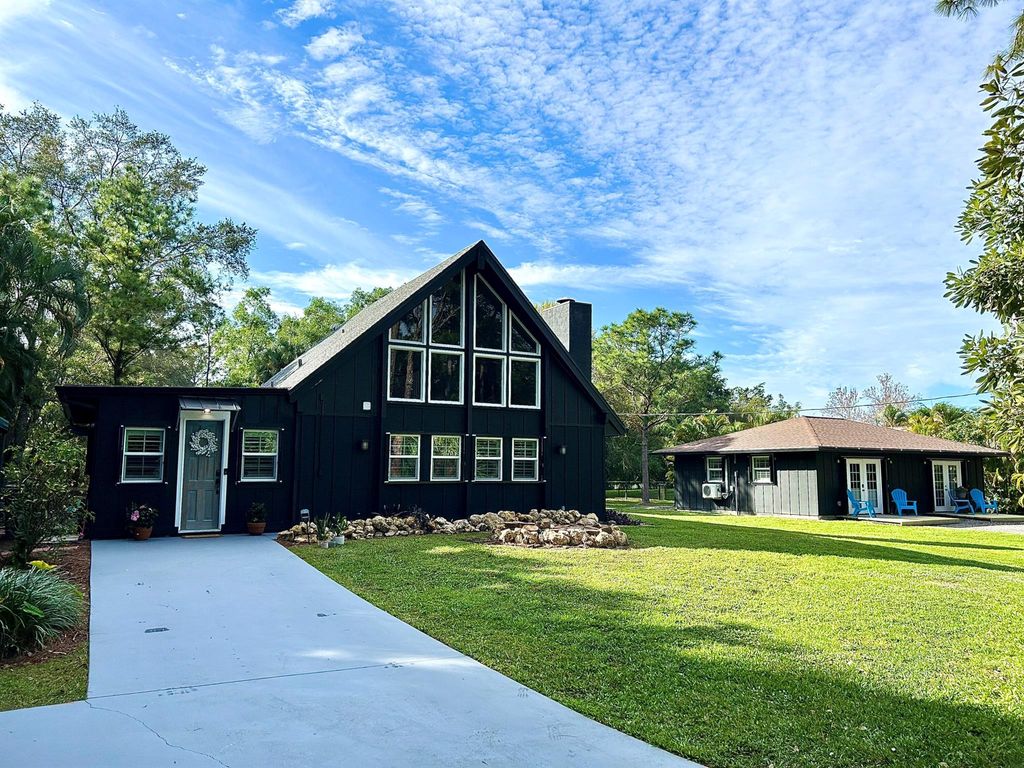 Photo of 10730 154 Road N, Jupiter, FL 33478 (MLS # R10951806)