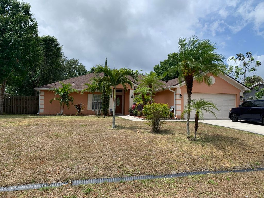 Photo of 964 SW Castaneda Lane, Port Saint Lucie, FL 34953 (MLS # R10796759)