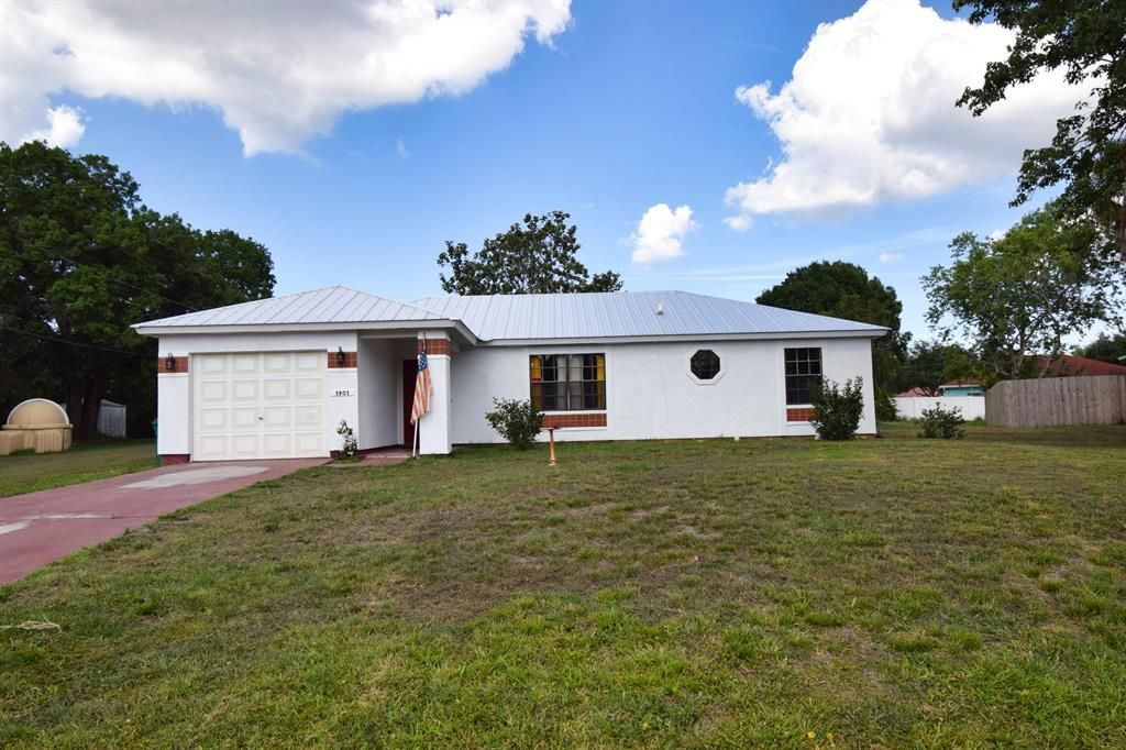 Photo of 1901 SW Agnes Street, Port Saint Lucie, FL 34953 (MLS # R10713239)