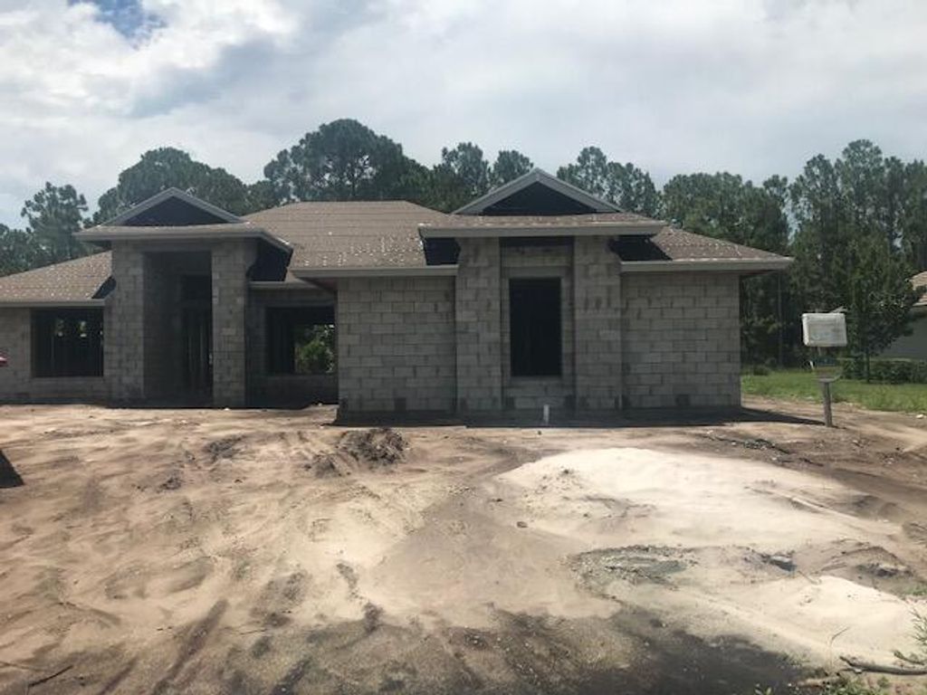 Photo of 9625 Knollwood Lane, Fort Pierce, FL 34951 (MLS # R10734552)