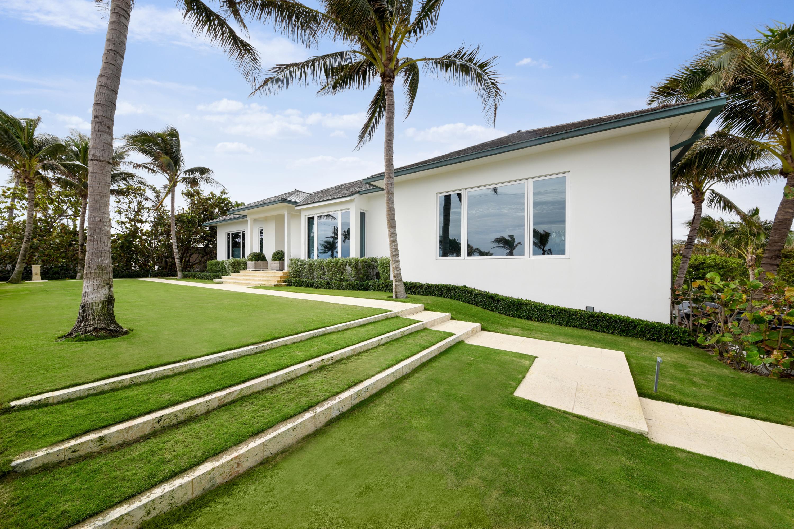 Completely Redone down to the same foot print & brought back up! North End Luxury with 5 Bed 6.5 Bath pool home with a 2 car garage and a private oceanfront cabana This all white & open floor plan offers abundant natural light and has the beach feel of an oceanfront residence in St. Barts. Interior features include imported concrete poured Italian polymer flooring & all impact seamless doors throughout imported from Germany. Boffi Style contemporary kitchen with corona countertops. Wolf Range and Gaggenau Refrigerator , media room , custom electronic shades throughout. Two bedroom staff apartment + tons of storage. This Smart home offers AV throughout, wireless speakers inside and out, integrated lighting systems, pool lighting and heating fully programmable from Smart Home Apps.