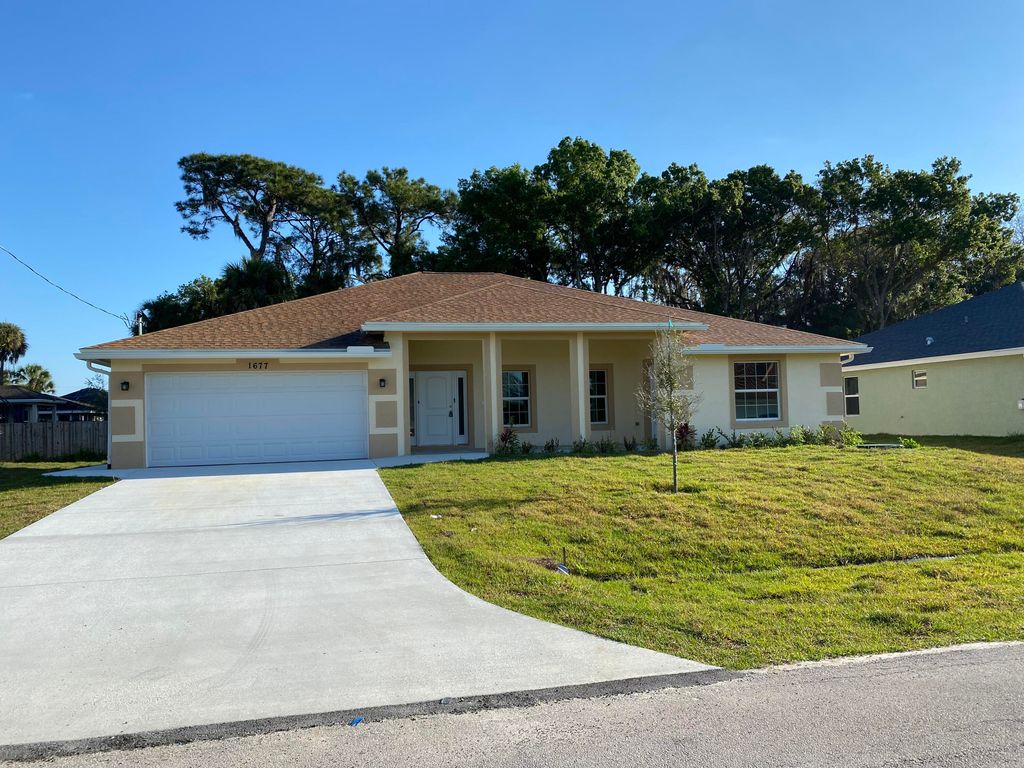 Photo of 1677 SW Lexington Drive, Port Saint Lucie, FL 34953 (MLS # R10779993)