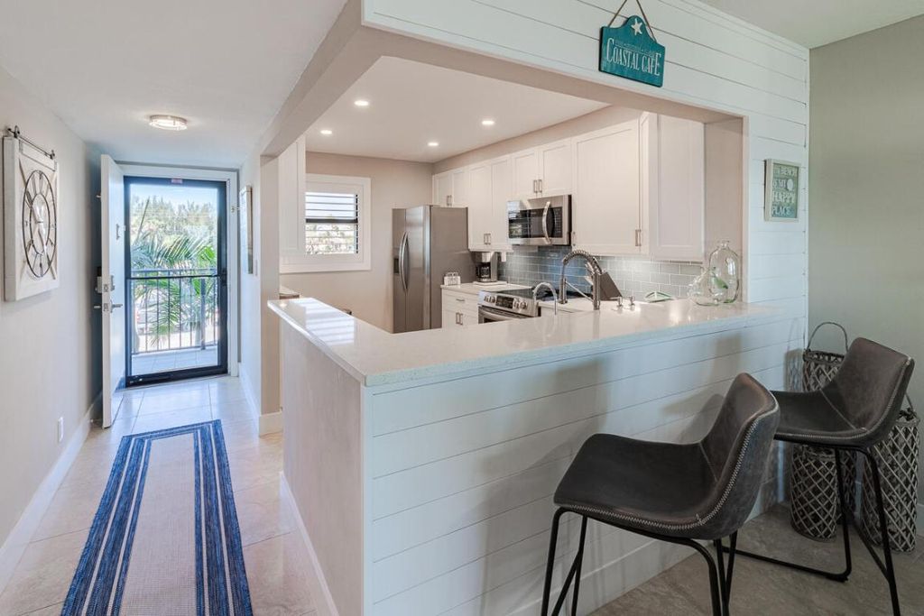 Photo of 9490 S Ocean Drive #215, Jensen Beach, FL 34957 (MLS # R10974226)