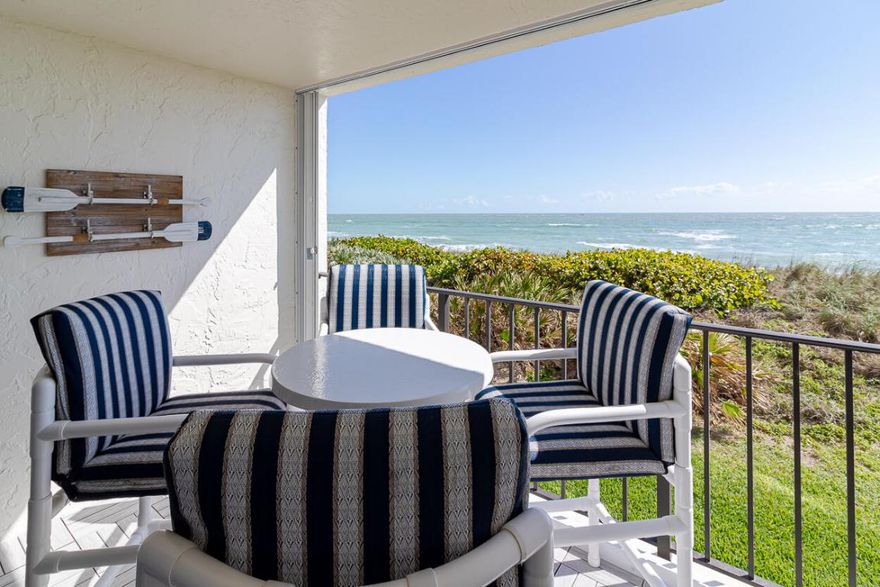 Experience stunning ocean views the moment you step into this impeccably renovated unit boasting new white shaker kitchen cabinets, quartz countertops, and stainless steel appliances. Both bathrooms have been completely overhauled, and every detail, from doors to trim, has been redone. Beautiful plantation shutters, impact windows, and sliders, alongside replaced hurricane shutters.  A newer A/C unit ensures comfort, replaced in 2022. The feel is coastal charm resembling a model home. Act quickly—seller covers the assessment, and with a full price offer, the balance of 2024 HOA dues. Don't miss out on this opportunity!