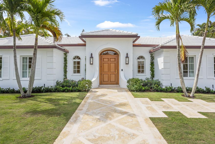 This exquisite 4-bedroom Bermuda-style home is ideally located near town and offers endless luxury and a sophisticated sensibility.  Features include: designer furnishings, museum-quality art, custom gourmet kitchen, Sub-Zero Designer Series oversize refrigerator, Wolf appliances, two Miele dishwashers, wine and coffee bar, designer lighting throughout, wide-plank white oak floors, soaring ceilings, Waterworks fixtures, steam shower, Toto Neorest toilets, heated pool, full house generator, and oversized air conditioned 2-car garage.  Quick access to the beach, lake trail, and Palm Beach's world-class shops restaurants.
