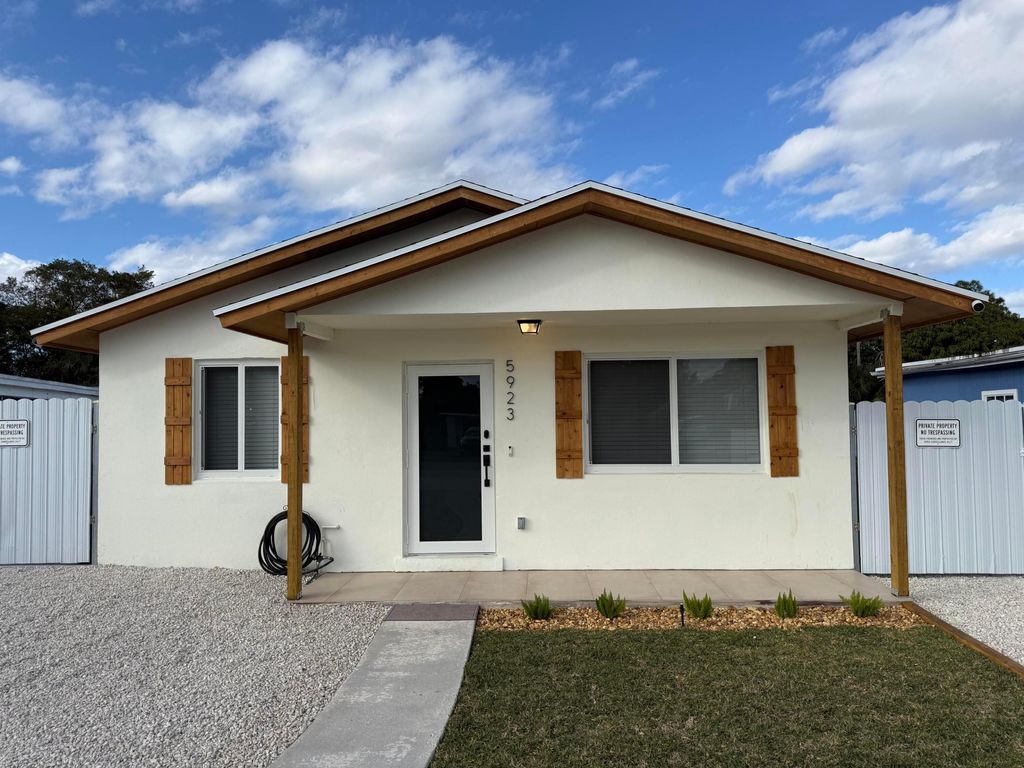 Photo of 5923 Mango Road, West Palm Beach, FL 33413 (MLS # R11162021)