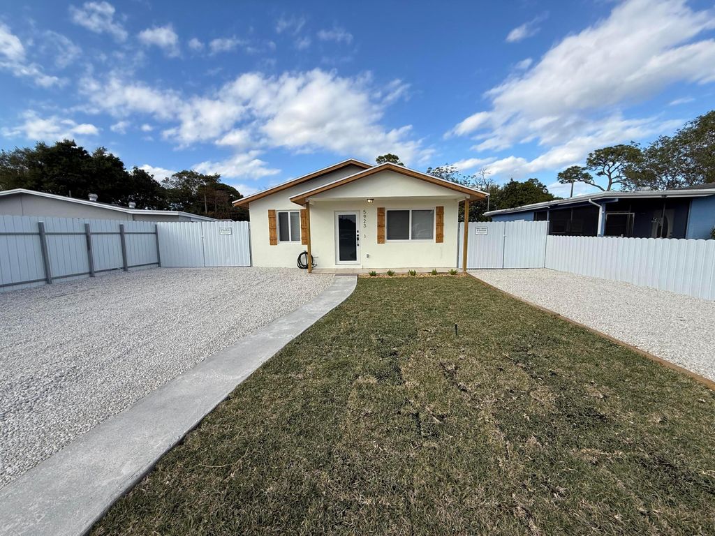 Photo of 5923 Mango Road, West Palm Beach, FL 33413 (MLS # R11162021)