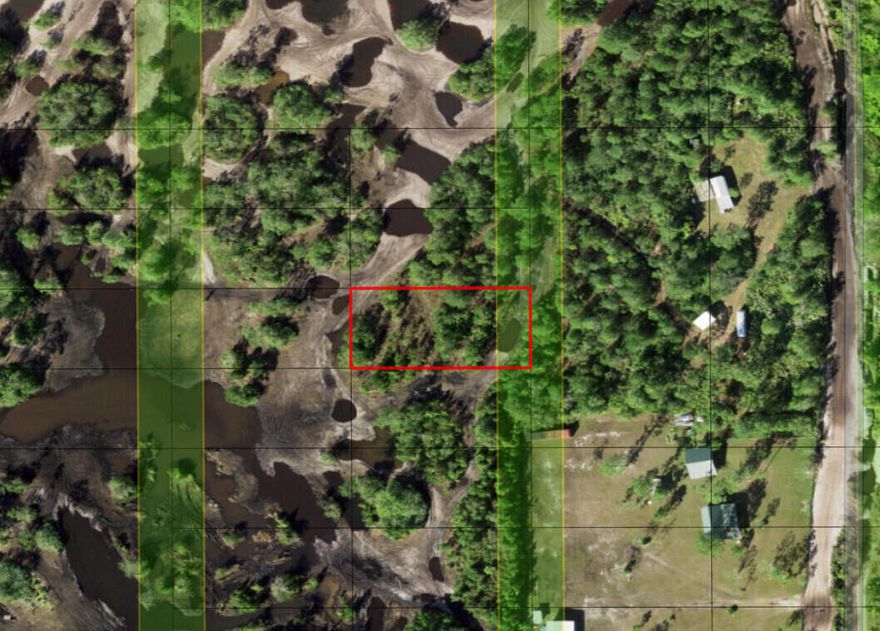 CAMP HUNT RIDE in Holopaw! Owner Financing available on this third of an acre campsite.