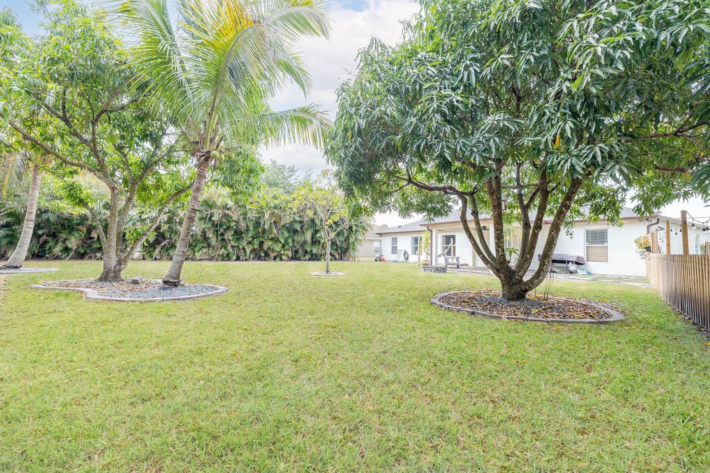 Photo of 6443 NW Regal Circle, Port Saint Lucie, FL 34983 (MLS # R10987135)