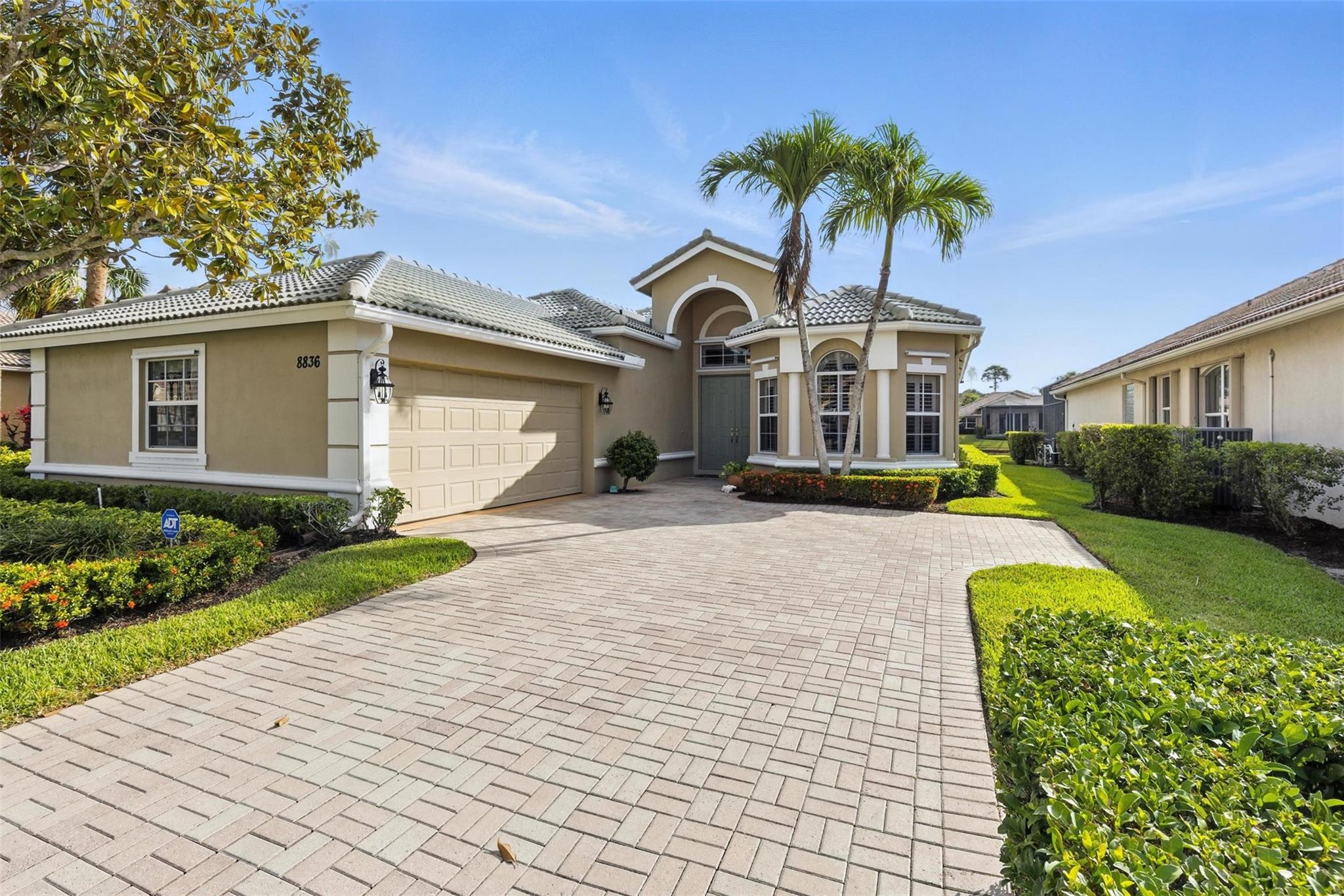 Owner says Bring an Offer !! Welcome to PGA Village, an exclusive all-ages gated community offering world-class amenities with no mandatory golf membership! This 3 bed, 2.5 bath home boasts a bright, open layout with soaring ceilings, elegant crown molding, updated kitchen, beautifully updated baths, new bedroom carpeting, plantation shutters, and power shades on the sliding doors. Step onto your extended, tiled, screened patio with serene lake views and a power storm shade—perfect for relaxing or entertaining. Live the luxury lifestyle with championship golf, a grand clubhouse, resort-style pool, fitness center, tennis, pickleball, and endless social events! Ideally located just minutes from I-95, dining, shopping, beaches, and entertainment, and the spring training home of the NY Mets.