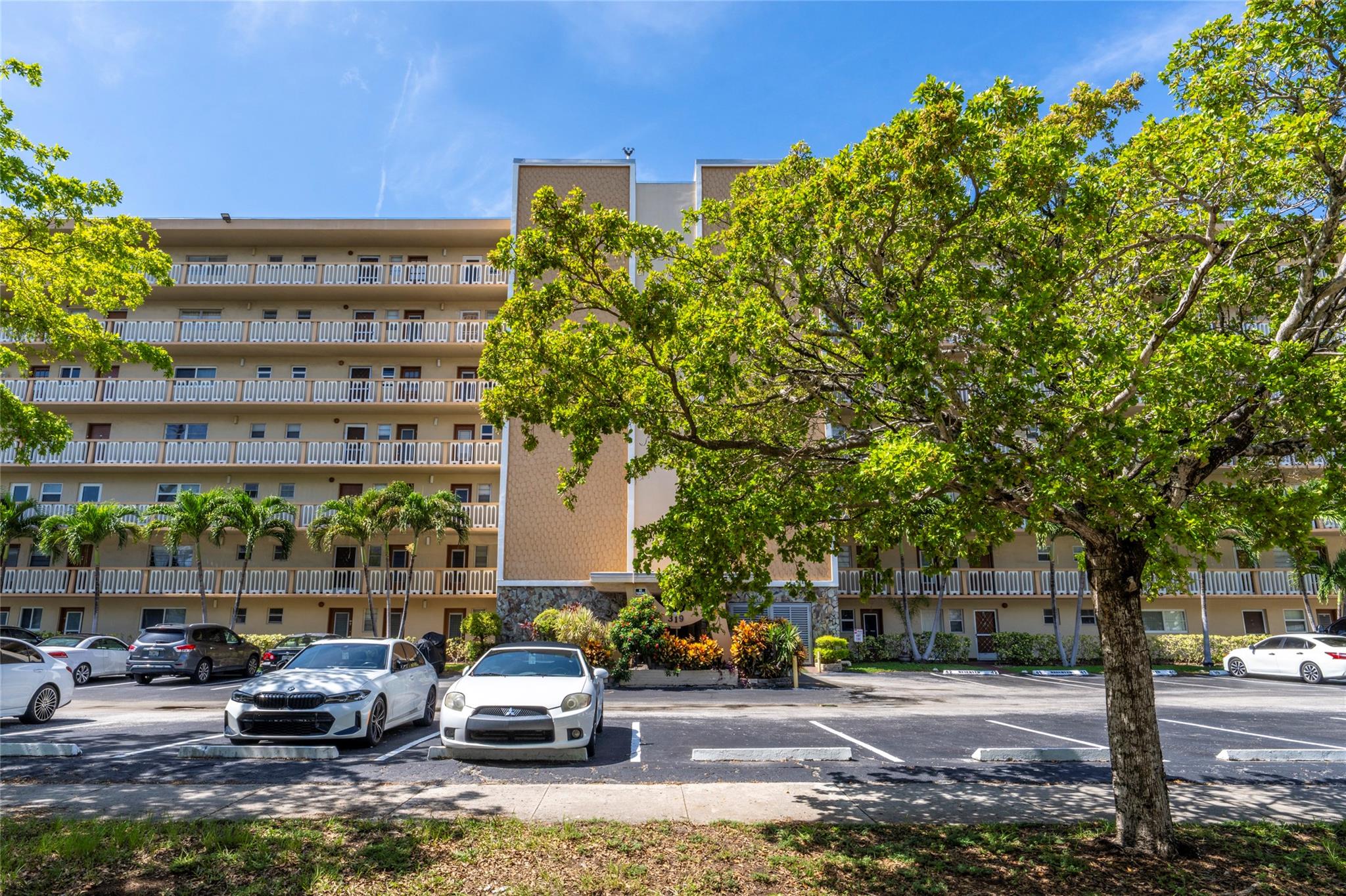Beautifully maintained 1-bedroom, 1-bath condo in a peaceful, well-kept community. Features a freshly painted interior, upgraded kitchen and bathroom, and an enhanced A/C system that keeps the entire unit cool and comfortable. Enjoy stunning views of the pool, clubhouse, and play area from both the bedroom and screened-in balcony. The unit offers plenty of closet space. This bright and clean unit can be offered partially furnished for your convenience. Laundry is located just steps away across the hall. Comes with one assigned parking space, plus guest parking available on a first-come, first-served basis. A perfect place to call home, offering comfort, convenience, and a relaxing atmosphere.