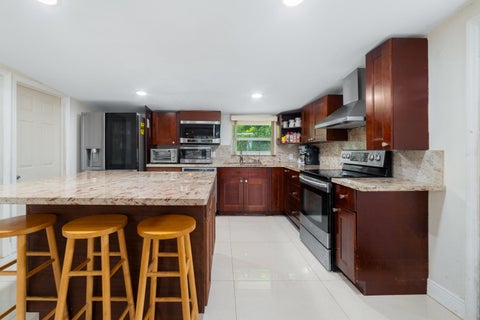 Tiny photo for 6635 Hope Street, Hollywood, FL 33024 (MLS # B26078836)